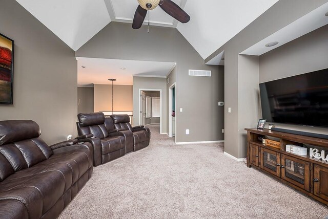 9500 Georgia Ave, Kansas City, KS 66109 - living area featuring a ceiling fan, carpet floors, high vaulted ceiling, and baseboards