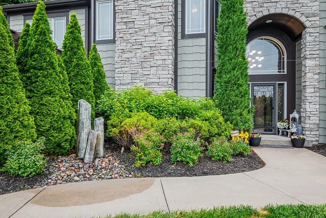 9500 Georgia Ave, Kansas City, KS 66109 - doorway to property with stone siding