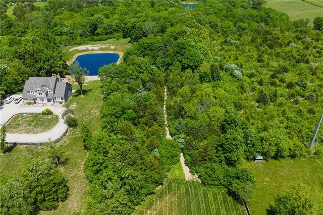 9500 Georgia Ave, Kansas City, KS 66109 - drone / aerial view of a nearby body of water and a forest