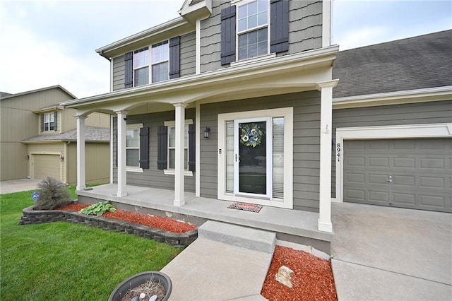 8941 NE 116th Pl, Kansas City, MO 64157 - view of exterior entry featuring a porch and a garage