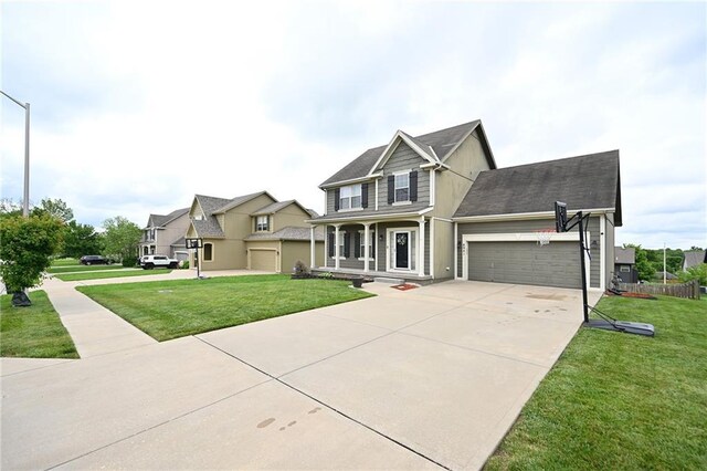 8941 NE 116th Pl, Kansas City, MO 64157 - view of front of property featuring driveway, a garage, a front lawn, and a porch