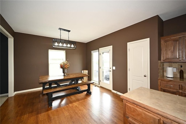 8941 NE 116th Pl, Kansas City, MO 64157 - dining room featuring dark wood finished floors and baseboards