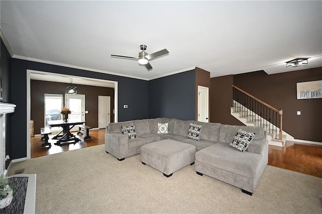 8941 NE 116th Pl, Kansas City, MO 64157 - living room with stairs, ceiling fan, crown molding, wood finished floors, and carpet flooring