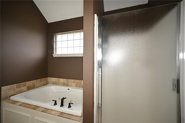 8941 NE 116th Pl, Kansas City, MO 64157 - bathroom with a jetted tub, a stall shower, and vaulted ceiling