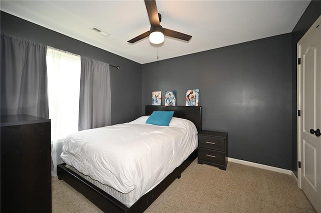 8941 NE 116th Pl, Kansas City, MO 64157 - carpeted bedroom featuring a ceiling fan and baseboards