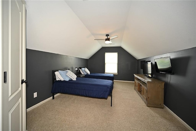 8941 NE 116th Pl, Kansas City, MO 64157 - bedroom with vaulted ceiling, light carpet, baseboards, and ceiling fan