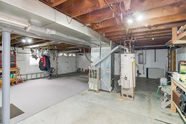 911 Limit St, Leavenworth, KS 66048 - unfinished below grade area with gas water heater, heating unit, and electric panel