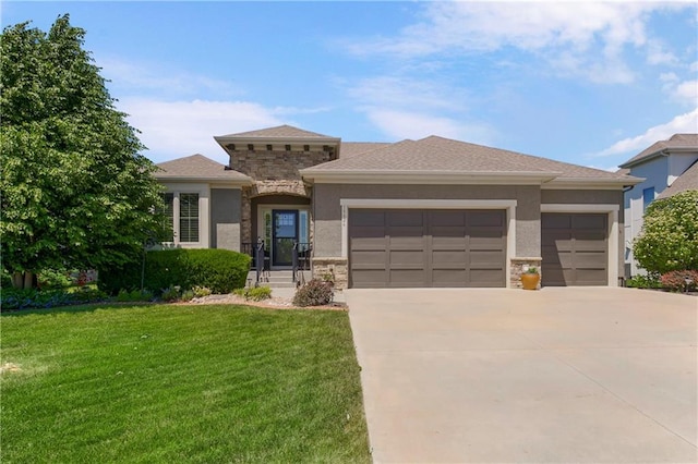 view of front of property featuring stone siding, an attached garage, stucco siding, a front yard, and driveway