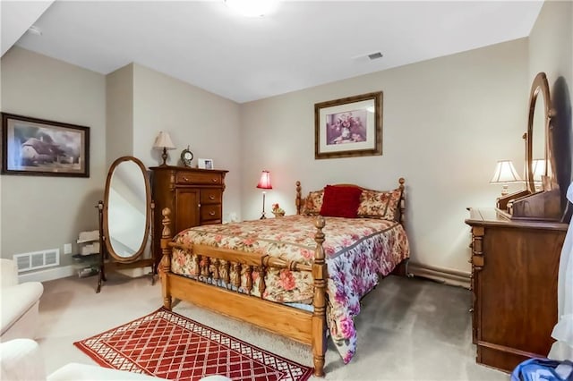 bedroom featuring carpet flooring and baseboards