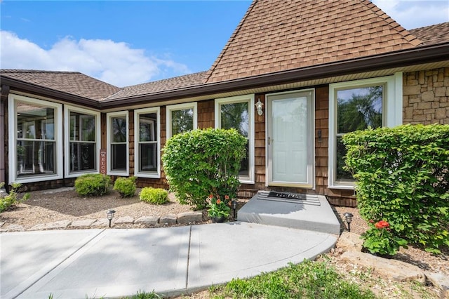 2018 Park Ln, Smithville, MO 64089 - doorway to property featuring a shingled roof