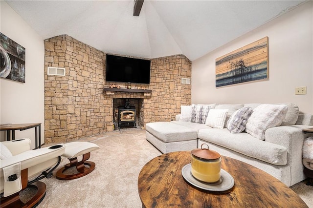 2018 Park Ln, Smithville, MO 64089 - carpeted living room with vaulted ceiling and a wood stove