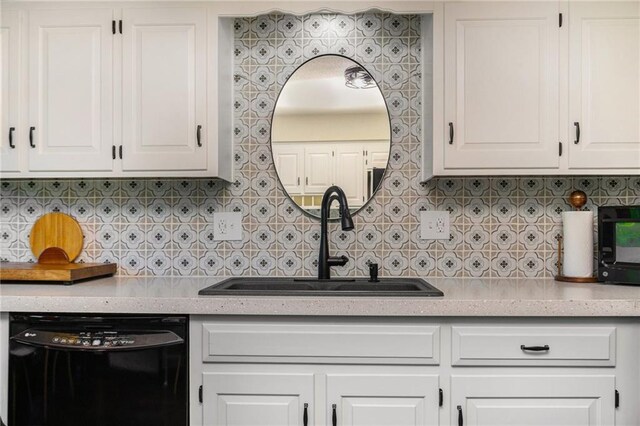 2018 Park Ln, Smithville, MO 64089 - kitchen with black dishwasher, a sink, tasteful backsplash, and light countertops