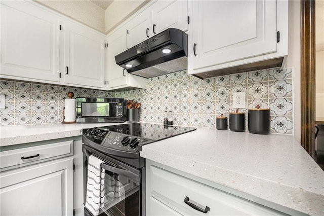 2018 Park Ln, Smithville, MO 64089 - kitchen featuring black appliances, under cabinet range hood, white cabinetry, and backsplash