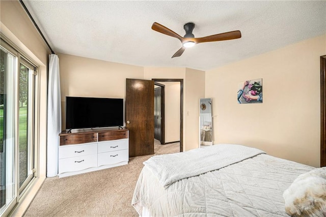 2018 Park Ln, Smithville, MO 64089 - bedroom featuring light colored carpet, a textured ceiling, and a ceiling fan