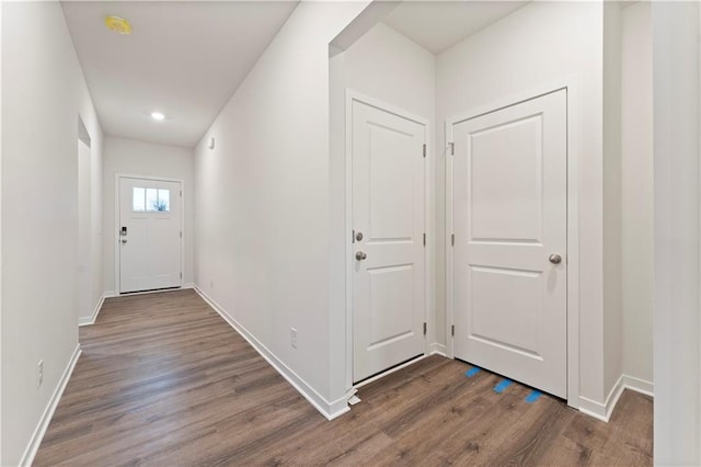 2114 Creek View Ln, Raymore, MO 64083 - hall featuring wood finished floors, baseboards, and recessed lighting