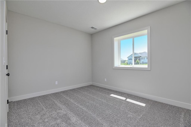5854 Mccormick Dr, Shawnee, KS 66226 - carpeted spare room with baseboards