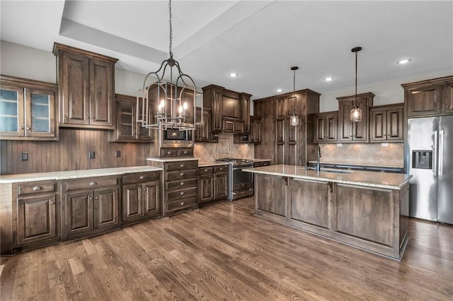 12750 N Arbor Way, Platte City, MO 64079 - kitchen with appliances with stainless steel finishes, dark brown cabinetry, a sink, and recessed lighting