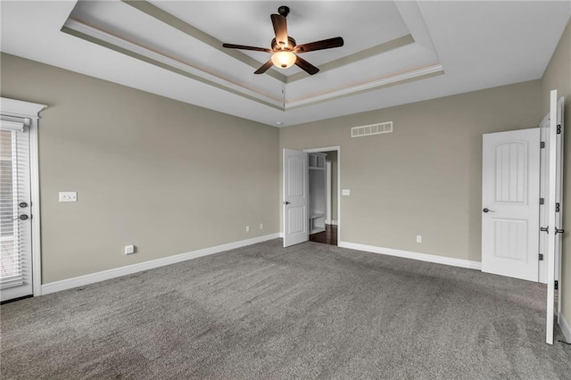 12750 N Arbor Way, Platte City, MO 64079 - carpeted empty room with a raised ceiling, a ceiling fan, and baseboards
