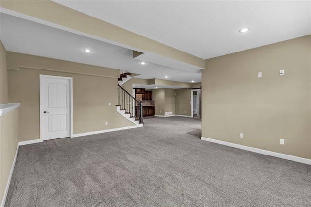 12750 N Arbor Way, Platte City, MO 64079 - unfurnished living room featuring stairway, carpet, baseboards, and recessed lighting
