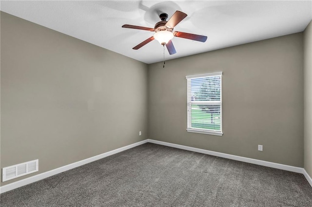 12750 N Arbor Way, Platte City, MO 64079 - spare room featuring baseboards, dark colored carpet, and ceiling fan