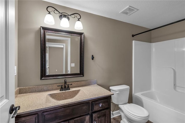 12750 N Arbor Way, Platte City, MO 64079 - full bath featuring vanity, toilet, bathtub / shower combination, a textured ceiling, and baseboards