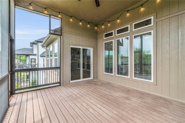 12750 N Arbor Way, Platte City, MO 64079 - unfurnished sunroom with rail lighting