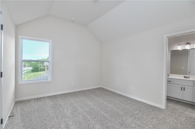 111 N Singletree St, Olathe, KS 66061 - bonus room featuring vaulted ceiling, light colored carpet, baseboards, and a sink