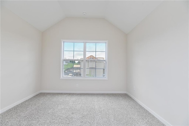 111 N Singletree St, Olathe, KS 66061 - empty room with carpet flooring, baseboards, and lofted ceiling