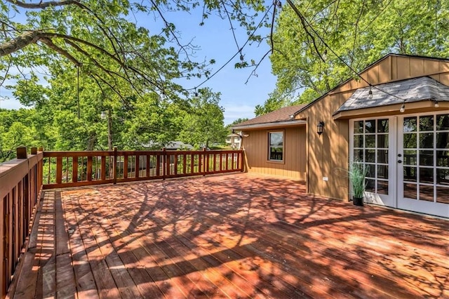 wooden deck featuring french doors