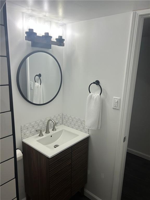 1919 Seneca St, Leavenworth, KS 66048 - bathroom with vanity and baseboards