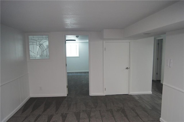 1919 Seneca St, Leavenworth, KS 66048 - below grade area with baseboards and carpet flooring