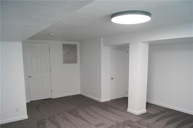 1919 Seneca St, Leavenworth, KS 66048 - finished below grade area with carpet floors, baseboards, and a textured ceiling