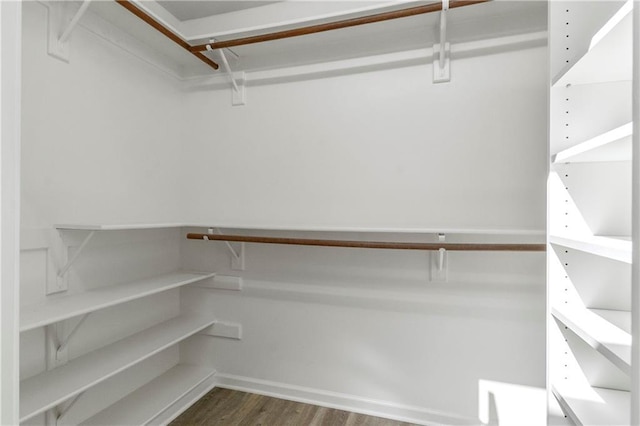 5037 W 120th Ter, Overland Park, KS 66209 - walk in closet featuring wood finished floors