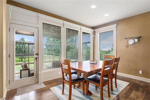 25205 W 97th Ter, Lenexa, KS 66227 - dining area with wood finished floors, recessed lighting, and a textured ceiling