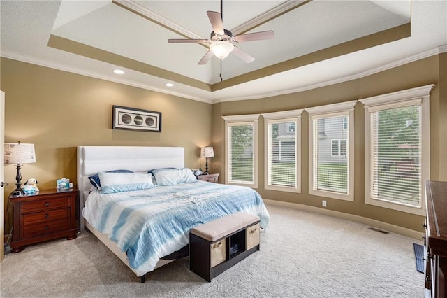 25205 W 97th Ter, Lenexa, KS 66227 - bedroom with a tray ceiling, light carpet, crown molding, recessed lighting, and a ceiling fan