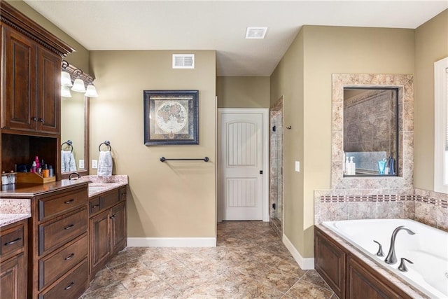25205 W 97th Ter, Lenexa, KS 66227 - bathroom with vanity, a bath, and a stall shower