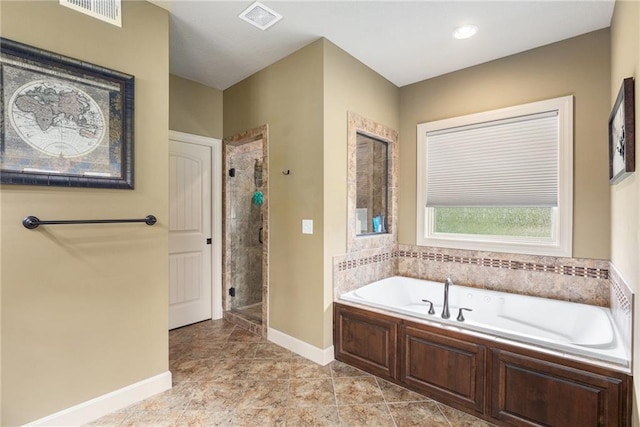 25205 W 97th Ter, Lenexa, KS 66227 - bathroom featuring a shower stall and a garden tub
