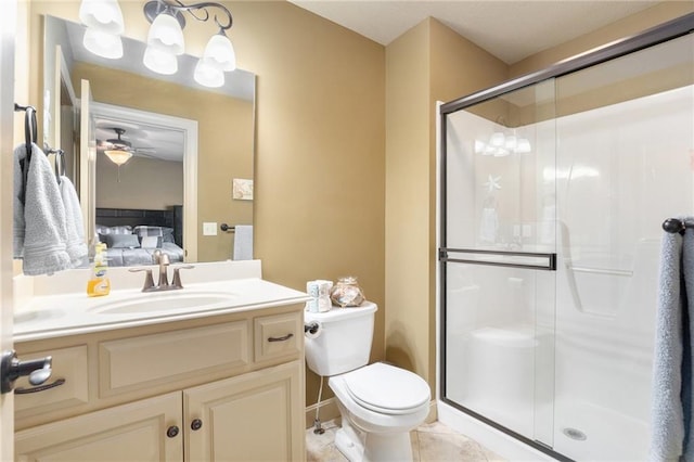 25205 W 97th Ter, Lenexa, KS 66227 - bathroom with connected bathroom, a shower stall, vanity, and a ceiling fan