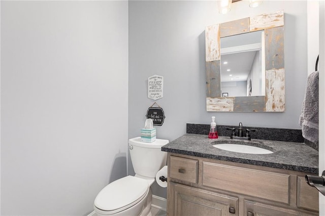25205 W 97th Ter, Lenexa, KS 66227 - bathroom featuring vanity and toilet