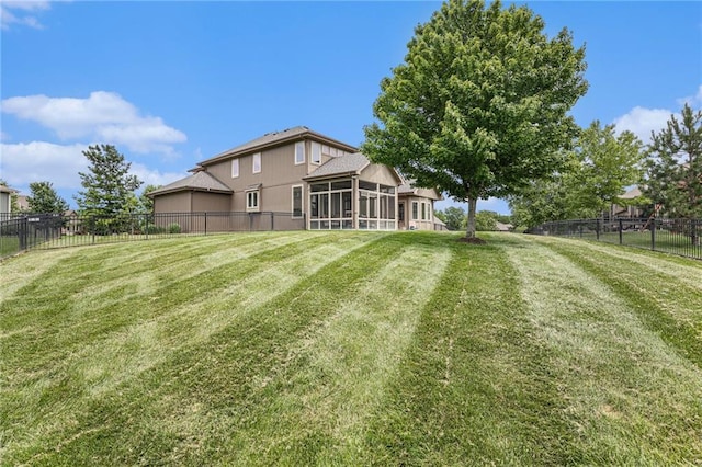 25205 W 97th Ter, Lenexa, KS 66227 - fenced backyard featuring a sunroom