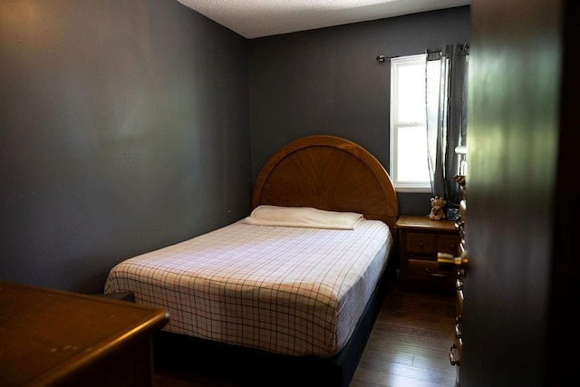 108 N Evanston Ave, Independence, MO 64053 - bedroom with dark wood-style floors