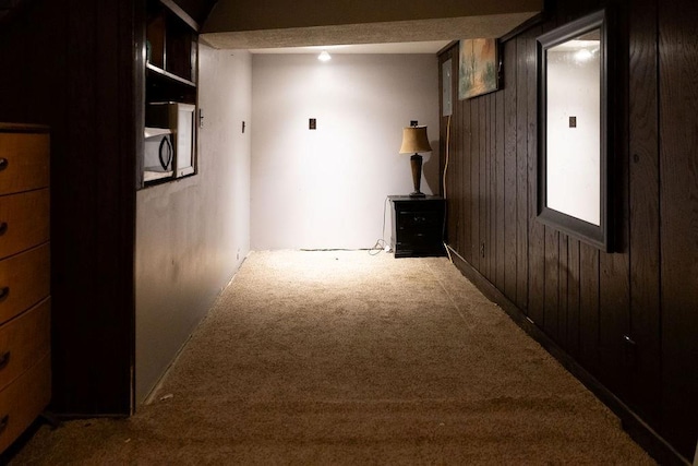 108 N Evanston Ave, Independence, MO 64053 - corridor with carpet flooring and wooden walls