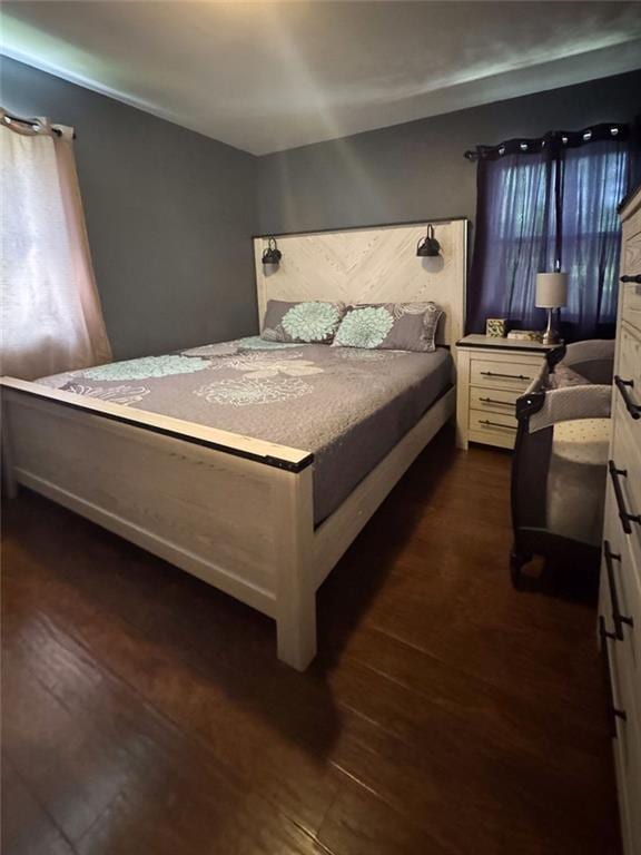 108 N Evanston Ave, Independence, MO 64053 - bedroom with dark wood-style floors