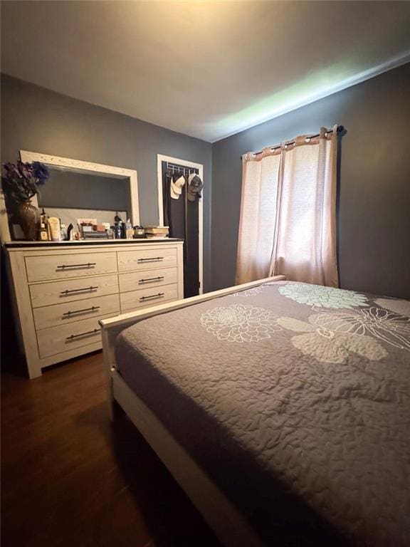 108 N Evanston Ave, Independence, MO 64053 - bedroom featuring dark wood-type flooring