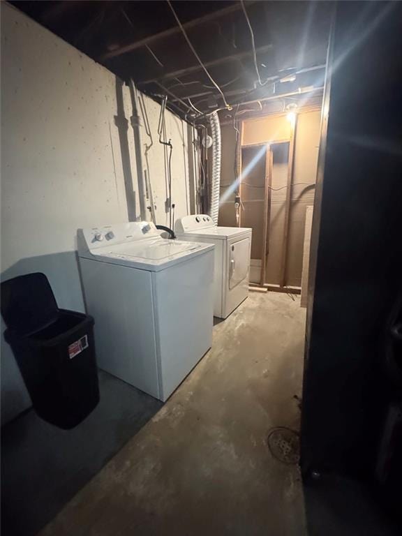 108 N Evanston Ave, Independence, MO 64053 - unfinished below grade area featuring washing machine and dryer