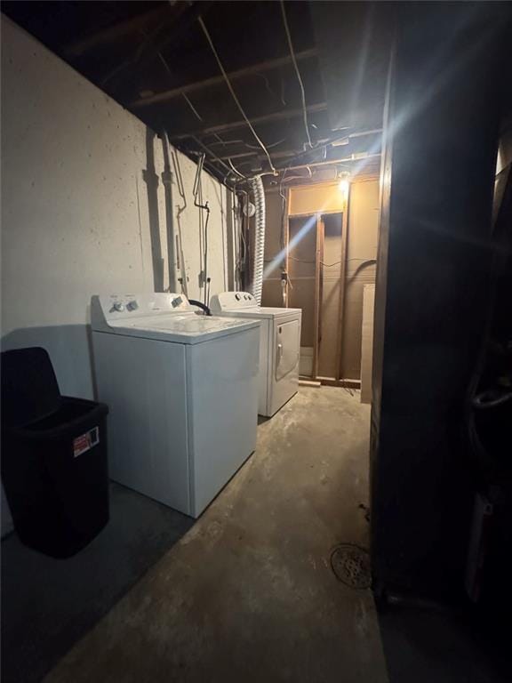 108 N Evanston Ave, Independence, MO 64053 - unfinished basement featuring washer and clothes dryer