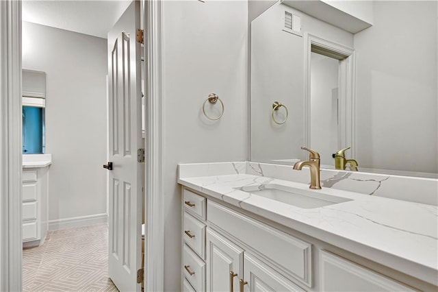 11349 Buena Vista St, Leawood, KS 66211 - bathroom with tile patterned floors and vanity