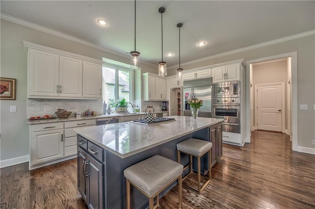 14814 Sherwood St, Leawood, KS 66224 - kitchen featuring white cabinetry, built in appliances, a sink, a center island, and a warming drawer