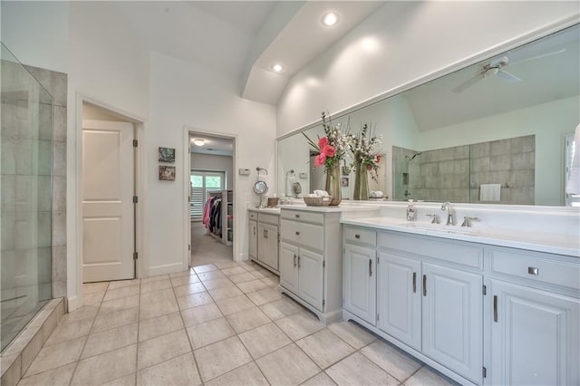 14814 Sherwood St, Leawood, KS 66224 - bathroom featuring a shower stall, vanity, lofted ceiling, recessed lighting, and a spacious closet