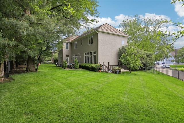 14814 Sherwood St, Leawood, KS 66224 - rear view of property with stucco siding and a tiled roof